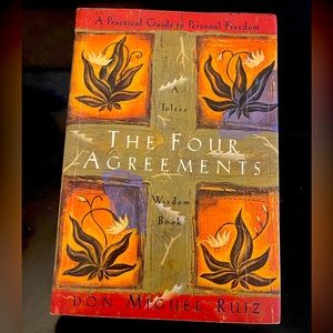 Book entitled “The Four Agreements” by Don Miguel Ruiz